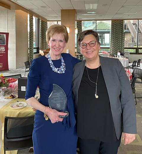 Susan Ross (left), with Hille Haker, holds Loyola University Chicago's Living Tradition Award. (Courtesy of Hank Center for the Catholic Intellectual Heritage)