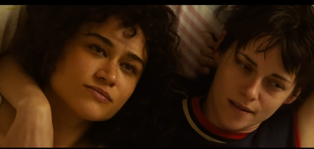 Katy O'Brian and Kristen Stewartz portray lovers caught up in violence in a New Mexico small town in the 1980s in "Love Lies Bleeding." (NCR screenshot/YouTube/A24 Films)