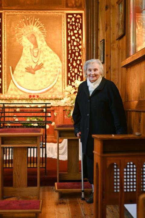 Sr. Nijole Sadunaite stands in her church in Vilnius, Lithuania, during an April 2023 interview.